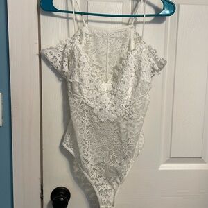 White lace size large bodysuit